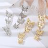 Elegant butterfly hair accessories in silver and gold, perfect for adding a touch of glamour to your hairstyle or special occasions. Stylish, lightweight, and durable.