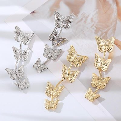 Elegant butterfly hair accessories in silver and gold, perfect for adding a touch of glamour to your hairstyle or special occasions. Stylish, lightweight, and durable.