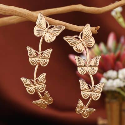 Elegant butterfly earrings for women, stylish gold butterfly jewelry, perfect for fashion accessories and gifts.