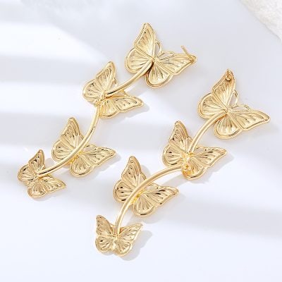 Stylish butterfly-shaped gold earrings for women, perfect for adding elegance and charm to your look. Premium jewelry accessories available at Monalisa Store.