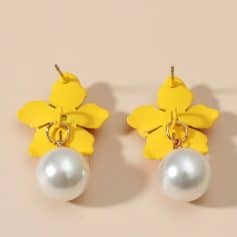 Fun floral statement earrings with yellow flower design and elegant pearl drop accents, perfect for enhancing your style and adding a touch of sophistication.