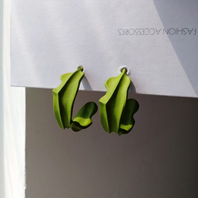 Stylish green statement earrings perfect for modern fashion & eye-catching accessories. Handmade with high-quality materials, suitable for all occasions.