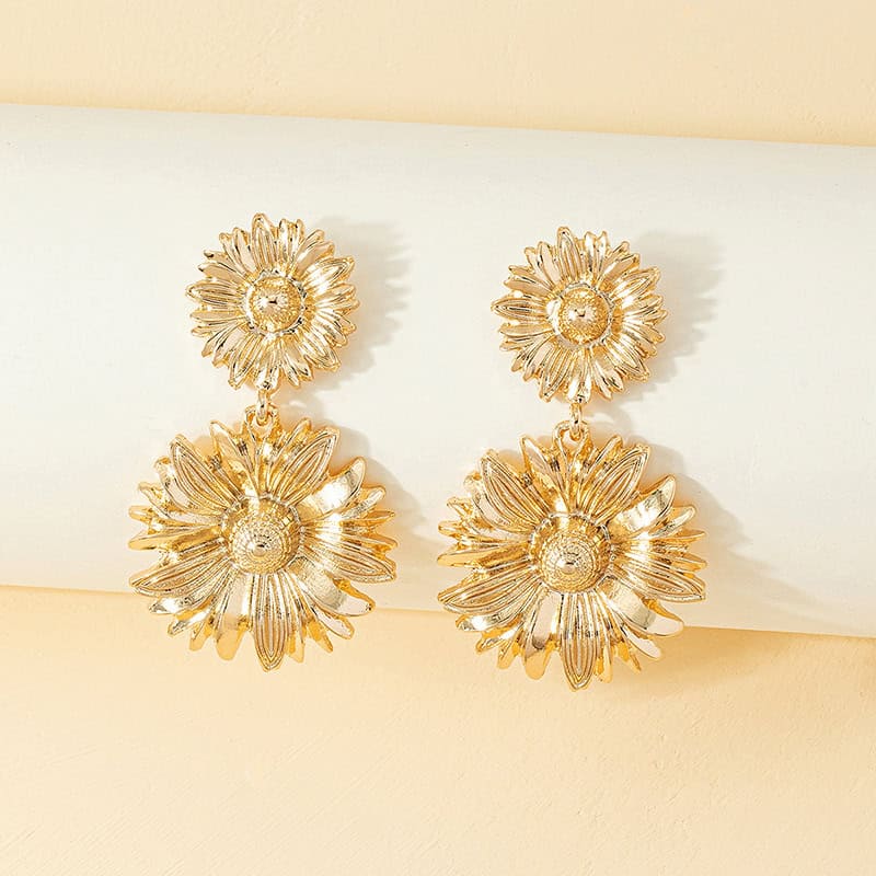 Gold flower earrings with layered petal design ideal for women, perfect for enhancing everyday style or special occasions. Crafted for durability and style.