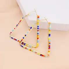 Vibrant beaded hoop earrings with multicolored beads, perfect for casual or trendy outfits. Made with high-quality materials, lightweight, and comfortable for everyday wear.