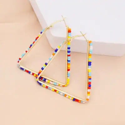 Vibrant beaded hoop earrings with multicolored beads, perfect for casual or trendy outfits. Made with high-quality materials, lightweight, and comfortable for everyday wear.