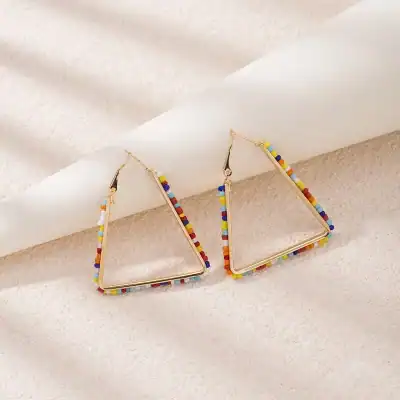 Vibrant beaded triangle earrings perfect for stylish and modern optical accessories, featuring multicolored beads and gold accents for a chic look.