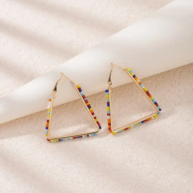 Vibrant beaded triangle earrings perfect for stylish and modern optical accessories, featuring multicolored beads and gold accents for a chic look.