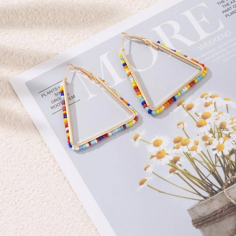Bright triangle earrings with multicolored bead accents, perfect for stylish accessory choices. Durable gold-tone hooks ideal for everyday wear and special occasions.