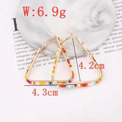 Bright multicolor beaded hoops with gold-tone accents, stylish jewelry for women, perfect for casual and party wear, lightweight and comfortable.