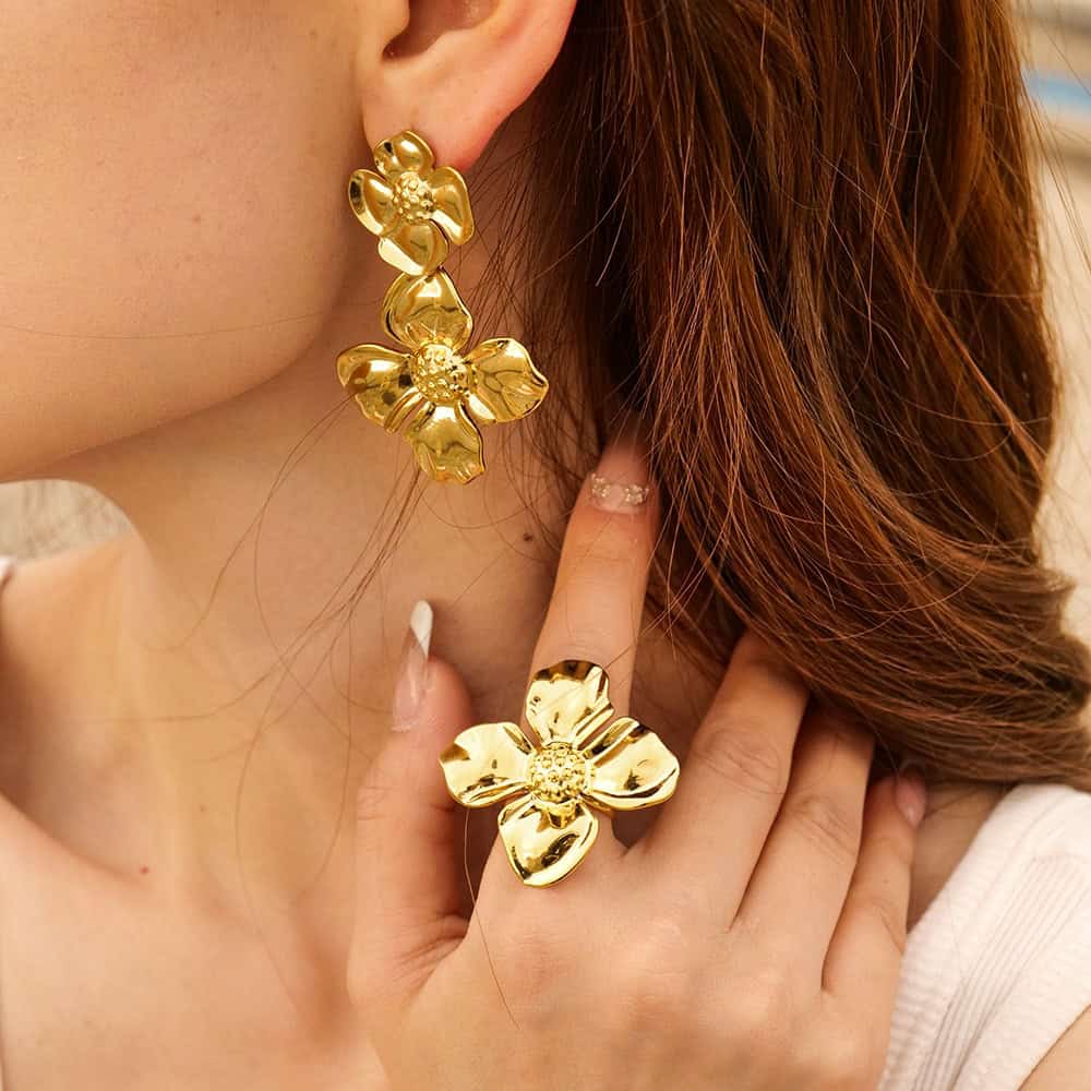Luxurious gold floral jewelry set featuring statement earrings and matching ring, perfect for special occasions or everyday chic, available at Monalisa Store.