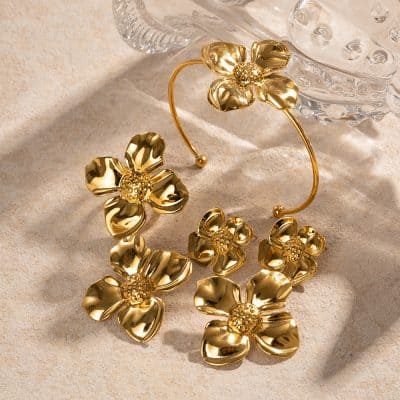 Elegant gold flower jewelry for women, including earrings and bracelets, perfect for fashion and accessorizing. Shop premium gold jewelry at Monalisa Store.