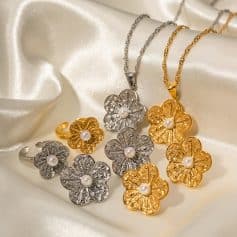 Delicate silver and gold flower-shaped jewelry with pearls, perfect for women seeking stylish accessories. Shop from Monalisa Store for exquisite jewelry collections and enhance your elegance.