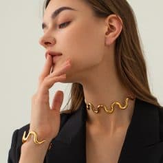 Stylish gold snake necklace, bracelet, and rings for women, perfect for fashion-forward accessories. Shop premium jewelry at Monalisa Store for a trendy, luxurious look.