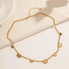 Delicate gold chain necklace with sun-shaped charms, perfect for stylish accessories and jewelry lovers. Ideal for enhancing your look with a touch of sunshine and elegance.