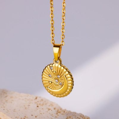 Gold moon pendant necklace with embedded crystals, available at Monalisa Store. Ideal for elegant jewelry collections, special occasions, and gift-giving for loved ones.