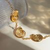 Luxury gold spiral necklace with chain, stylish jewelry accessory for women, perfect for all occasions, high-quality craftsmanship.