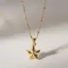 Elegant gold starfish pendant necklace, perfect for ocean-inspired jewelry lovers and beachwear accessories. High-quality craftsmanship suitable for everyday wear or special occasions.