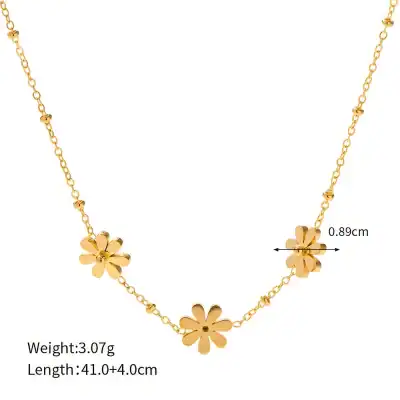 Elegant gold flower necklace with delicate chain, perfect for women seeking stylish jewelry. Features three floral charms, adjustable length, and lightweight design for daily wear or special occasions.