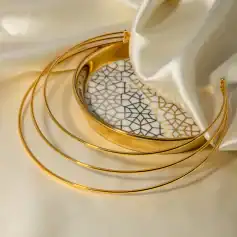 Stunning gold-plated bangles for women, perfect for traditional and modern outfits. Elevate your jewelry collection with this elegant accessory set.