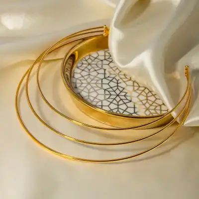 Stunning gold-plated bangles for women, perfect for traditional and modern outfits. Elevate your jewelry collection with this elegant accessory set.