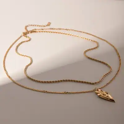 Elegant gold necklace with heart-shaped pendant, perfect for women's jewelry collection, fashion accessories, and gift ideas at Monalisa Medical Store.