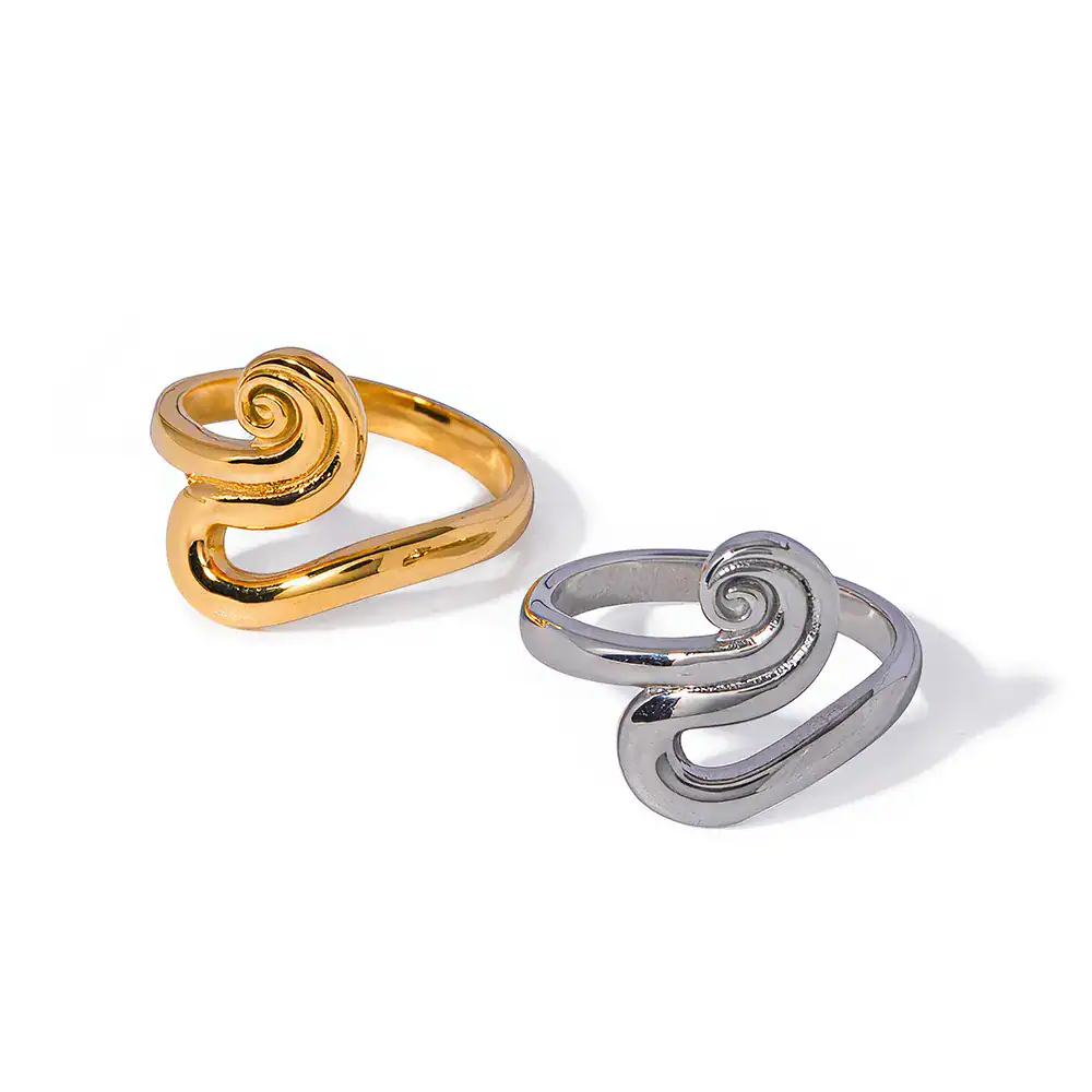 Stunning gold and silver swirl rings, ideal for fashion-forward jewelry lovers. Perfect for gifts or personal collection, crafted for style and elegance.
