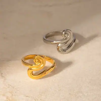 Stylish gold and silver spiral rings perfect for fashion-forward jewelry lovers and special occasions. Elegant, high-quality accessories to complement your look.