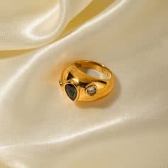 Luxurious gold ring featuring black and clear gemstones, perfect for accessorizing and jewelry lovers. Shop authentic, stylish rings at Monalisa Medical.