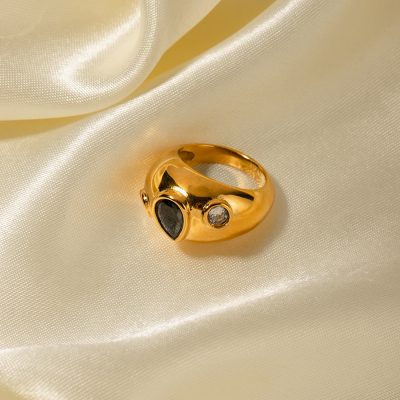 Luxurious gold ring featuring black and clear gemstones, perfect for accessorizing and jewelry lovers. Shop authentic, stylish rings at Monalisa Medical.