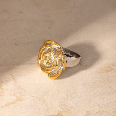 Elegant rose gold and silver ring with a rose design, perfect for fashion-forward and jewelry enthusiasts seeking stylish accessories.