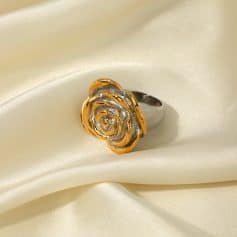 Intricate rose-shaped gold and silver ring, showcasing fine craftsmanship, perfect for jewelry lovers, available at Monalisa Store.