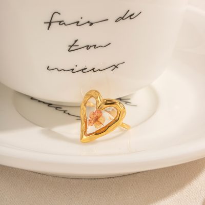 Elegant gold heart ring with pink flower design, perfect for women’s jewelry collection, stylish accessories, and gift ideas from Monalisa Store.