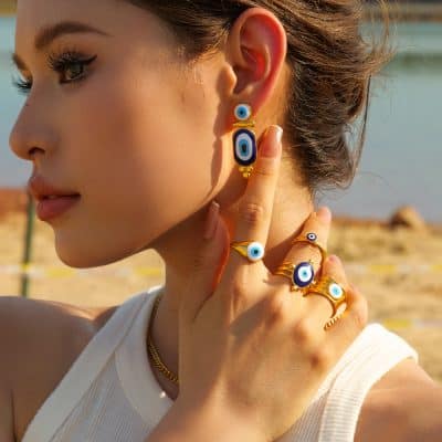 Colorful eye-themed jewelry for women, stylish earrings and rings, perfect for modern fashion and statement accessories.