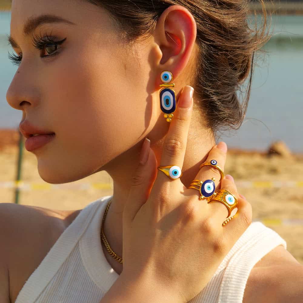Colorful eye-themed jewelry for women, stylish earrings and rings, perfect for modern fashion and statement accessories.
