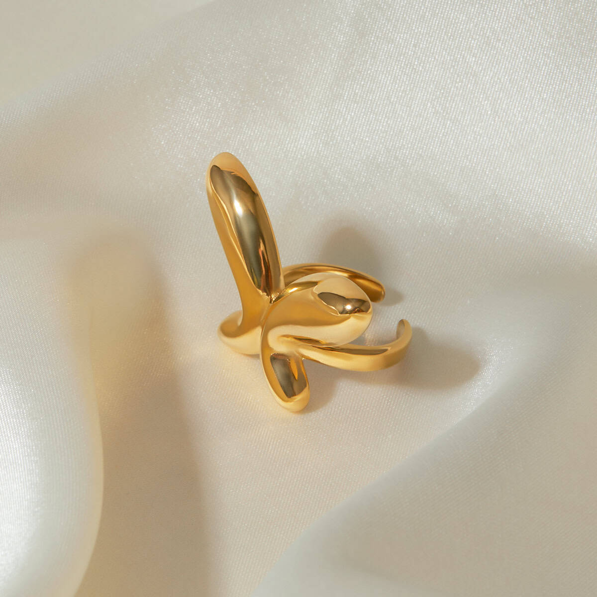 Gold bunny-shaped ring for stylish accessories, perfect for fashion or gift purposes. High-quality craftsmanship and unique design make it a standout jewelry piece.