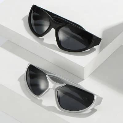 Stylish black and silver sunglasses with UV protection, perfect for fashion-forward individuals seeking high-quality eyewear from Monalisa Store.