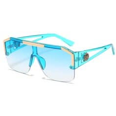 Stylish blue sunglasses featuring mirrored lenses, ideal for sports and outdoor activities, with durable frame and UV protection. Perfect for active lifestyles and fashion-conscious individuals.