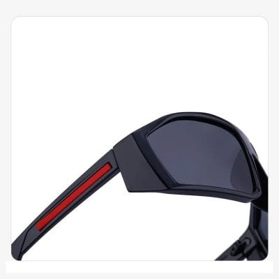 High-quality black sunglasses with red accent on the arm, stylish and durable, perfect for eye protection and fashion statements.