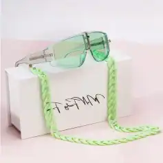 Stylish green-tinted sunglasses with chain strap, perfect for fashionable eye wear and optical fashion accessories at Monalisa Store.