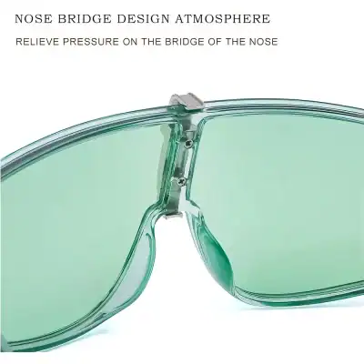 High-quality green-tinted sunglasses for sun protection and style, featuring a durable frame and polarized lenses designed for optimal eye comfort.