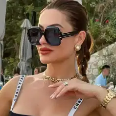 Stylish oversized black sunglasses for women at Monalisa Store. Perfect for a chic look and UV protection. Shop fashionable eyewear today for trendy style.