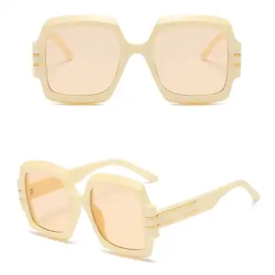 Stylish oversized sunglasses with light beige frames and tinted lenses, perfect for sun protection and fashion statements.