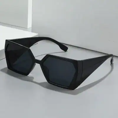 High-fashion black angular sunglasses with tinted lenses, perfect for modern eyewear fashion.