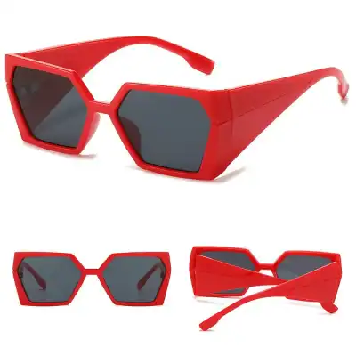 Stylish red hexagon-frame sunglasses with dark lenses, perfect for trendy sun protection. Lightweight and durable design ideal for fashion-forward individuals.