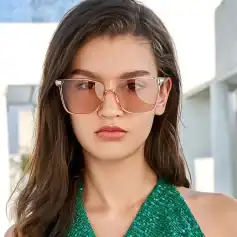 Elegant women's sunglasses with pink tinted lenses, perfect for fashion and sun protection at Monalisa Store.