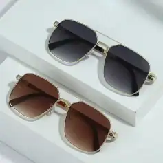 Elegant sunglasses featuring gold metal frames and tinted lenses, perfect for fashion and sun protection. Available at Monalisa Store for stylish eyewear accessories.