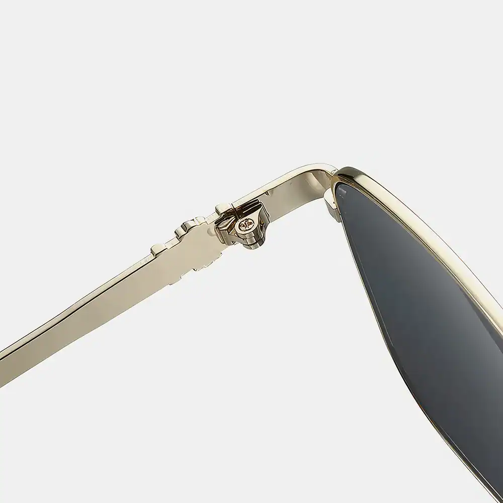 Premium designer sunglasses with sleek metal frames, UV protection lenses, and durable craftsmanship for stylish sun protection. Perfect for fashion-forward individuals seeking high-quality optical accessories.