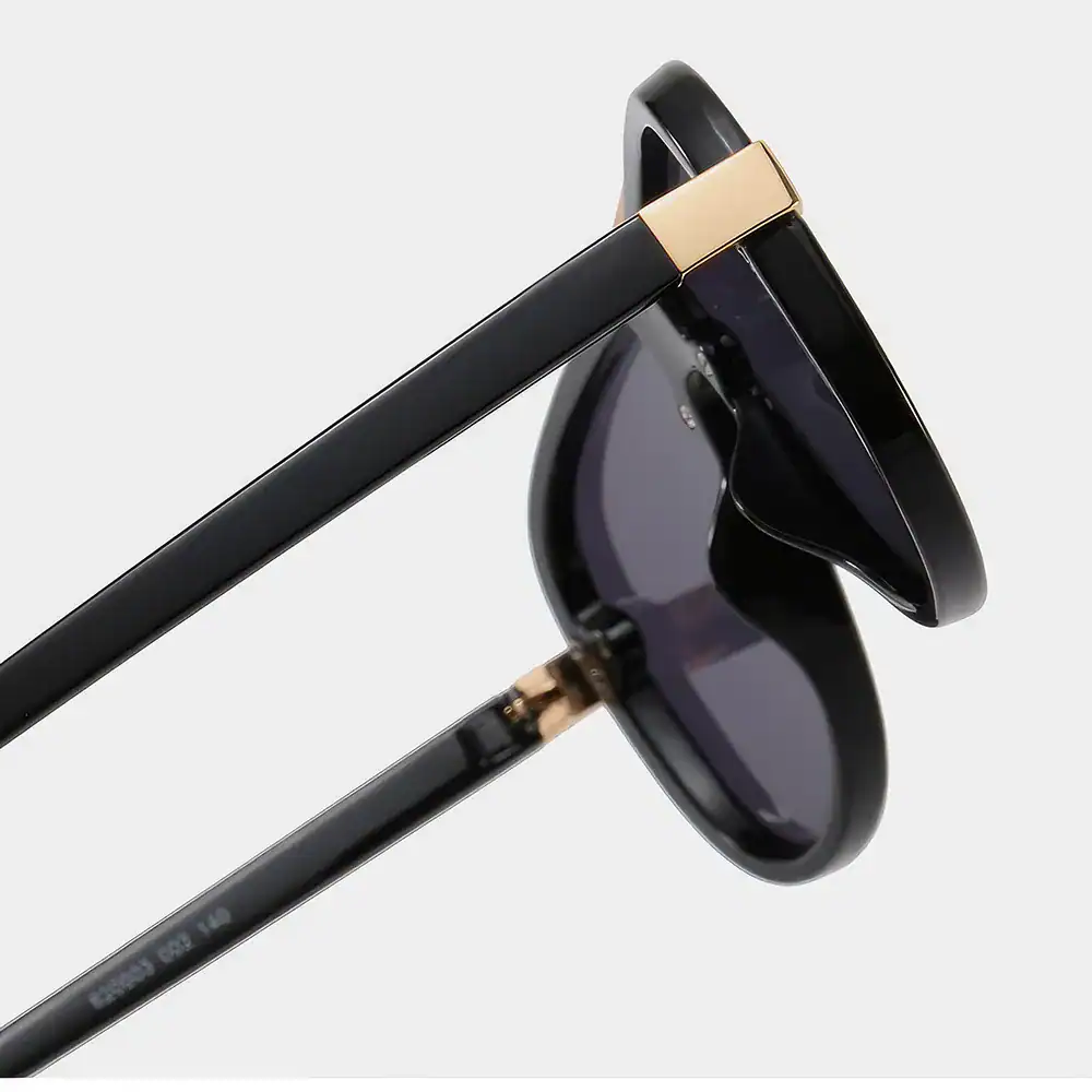 High-quality black sunglasses with gold details, perfect for UV protection and fashion statement. Ideal for outdoor activities, providing both style and eye safety.