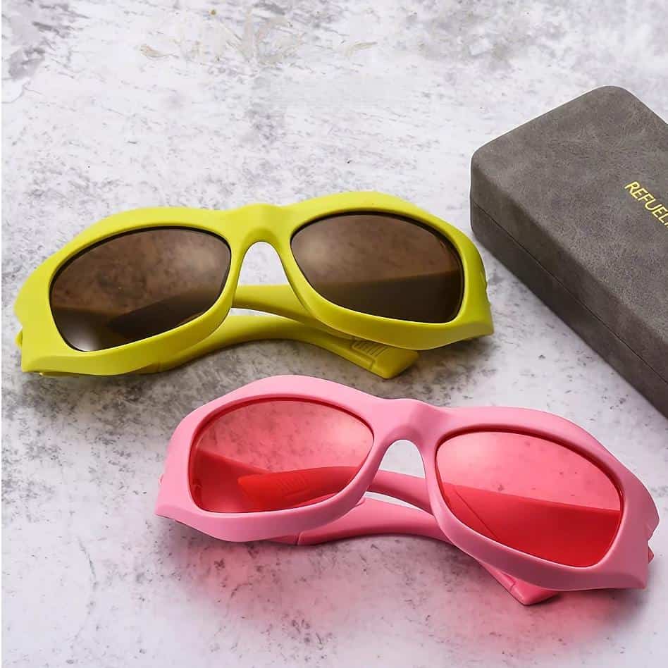 Child-safe sunglasses with yellow and pink frames, polarized lenses, and durable construction for active kids.
