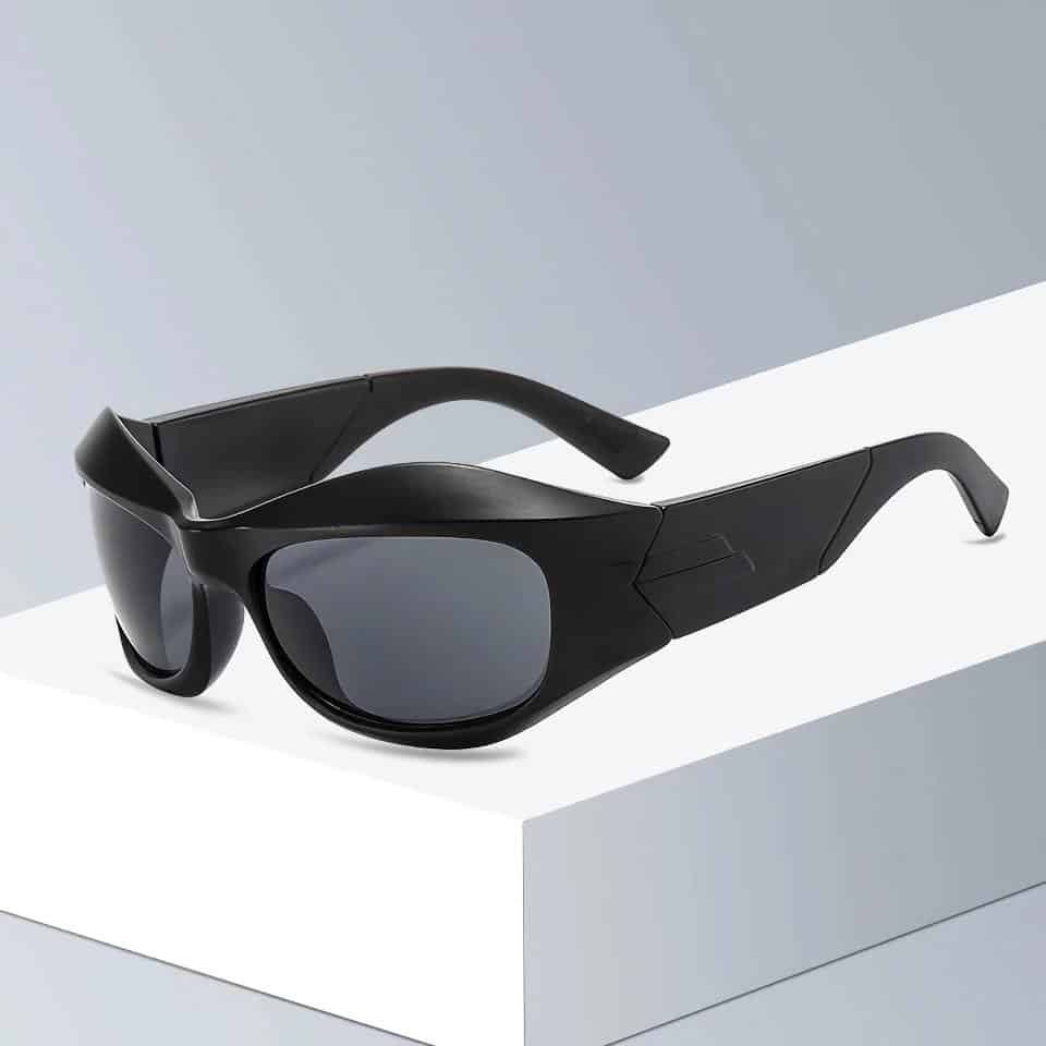 Premium black sunglasses with tinted lenses, perfect for sun protection and stylish outdoor wear. Designed for comfort and durability, ideal for fashion-conscious individuals.
